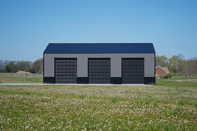 exterior space featuring fence and an outdoor structure