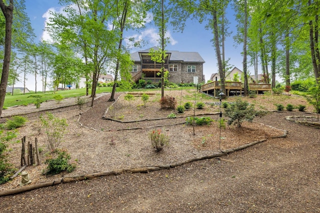 view of play area featuring a wooden deck