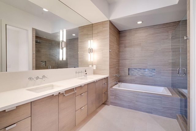 1106 Sigler St, Nashville, TN 37203 - full bathroom featuring a sink, a tile shower, double vanity, and a relaxing tiled tub