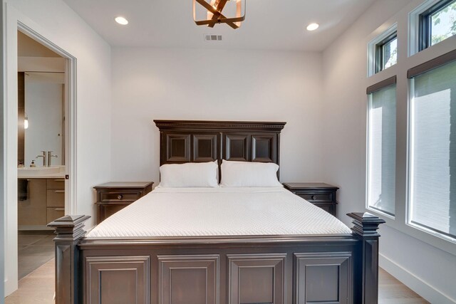 1106 Sigler St, Nashville, TN 37203 - bedroom featuring visible vents, recessed lighting, connected bathroom, and baseboards