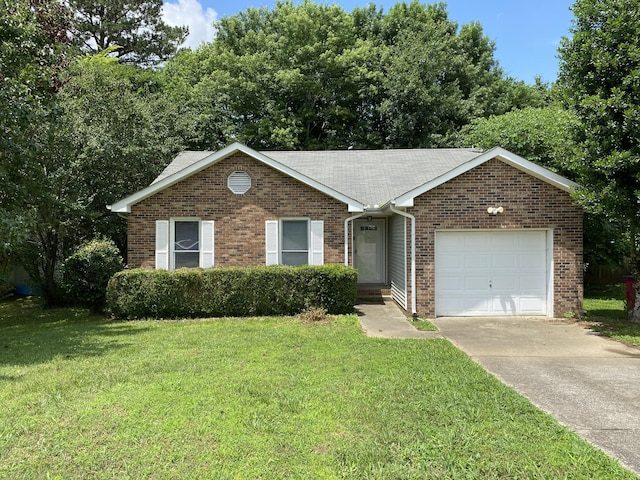 168 Shady Maple Dr, Clarksville, TN 37043 - ranch-style house with brick siding, a front lawn, a garage, and concrete driveway