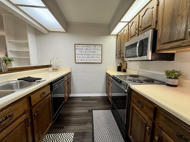 317 Village Ln W, Dickson, TN 37055 - kitchen featuring light countertops, stainless steel microwave, electric stove, ornamental molding, and black dishwasher