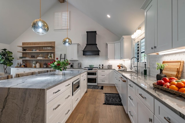 2025 Sanford Dr, Mount Juliet, TN 37122 - kitchen featuring light stone countertops, a sink, light wood finished floors, stainless steel appliances, and custom range hood