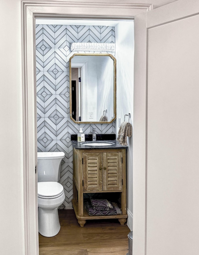 2025 Sanford Dr, Mount Juliet, TN 37122 - half bath with vanity, wood finished floors, and toilet