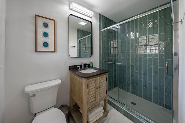 2025 Sanford Dr, Mount Juliet, TN 37122 - bathroom with vanity, a stall shower, and toilet