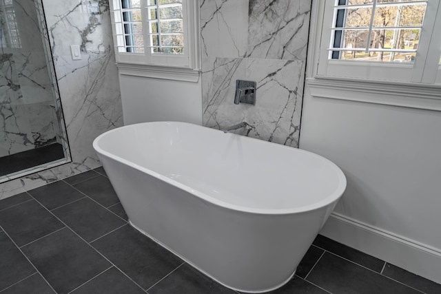 2025 Sanford Dr, Mount Juliet, TN 37122 - full bathroom with plenty of natural light, a marble finish shower, tile patterned floors, and a soaking tub