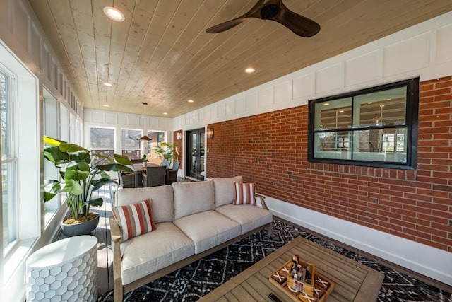 2025 Sanford Dr, Mount Juliet, TN 37122 - sunroom featuring an outdoor hangout area, a ceiling fan, wood ceiling, and brick wall