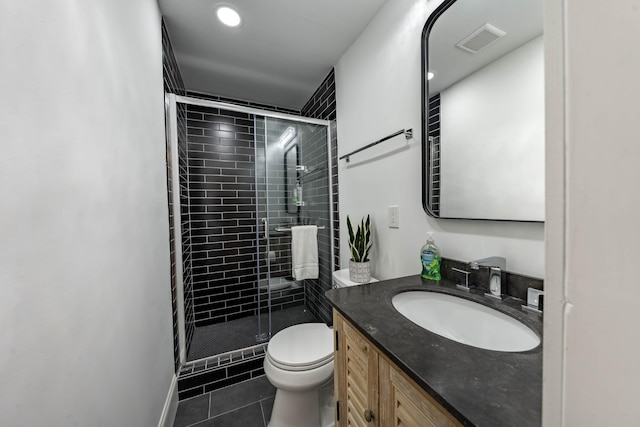 2025 Sanford Dr, Mount Juliet, TN 37122 - bathroom featuring visible vents, vanity, toilet, tile patterned floors, and a shower stall