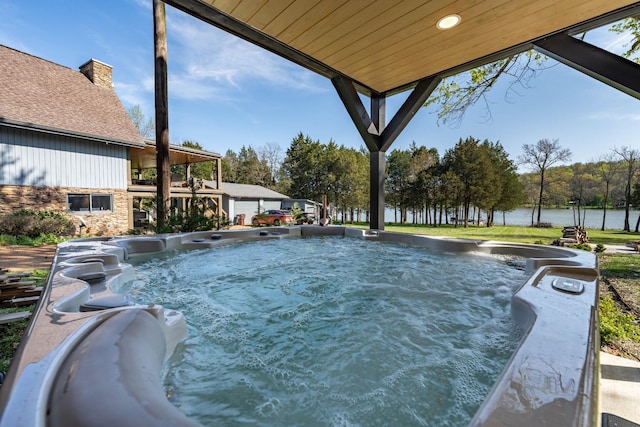 2025 Sanford Dr, Mount Juliet, TN 37122 - view of swimming pool featuring a hot tub and a water view