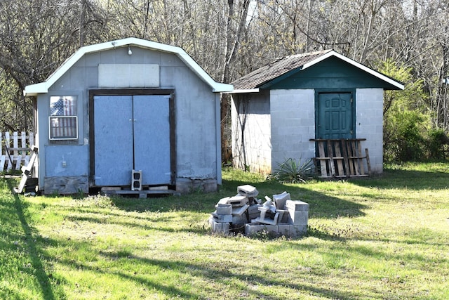view of shed with fence