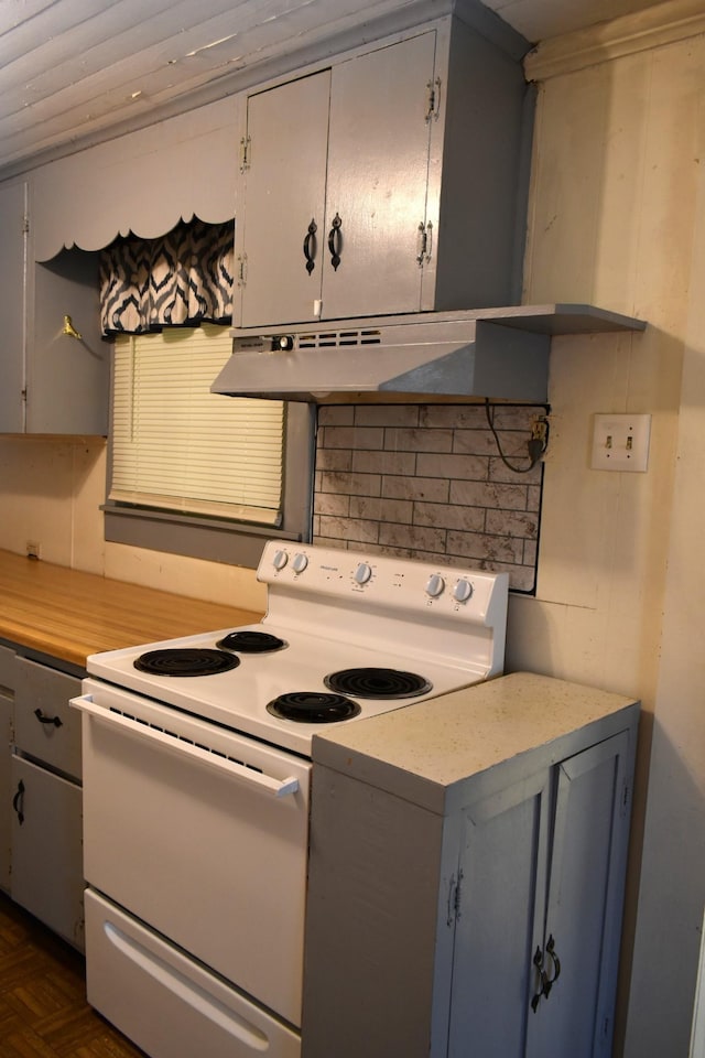 kitchen featuring under cabinet range hood, electric range, gray cabinetry, and light countertops