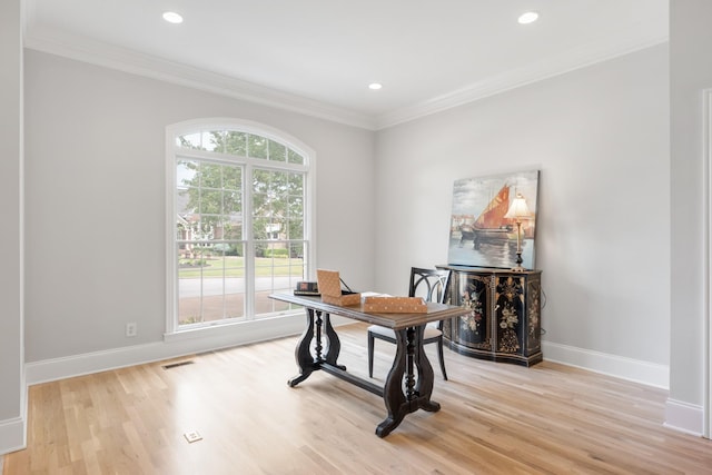 office area with visible vents, crown molding, light wood-type flooring, baseboards, and recessed lighting
