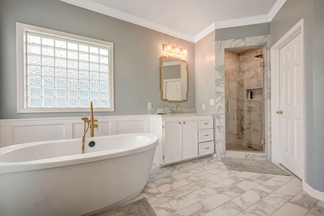 full bathroom with vanity, ornamental molding, marble finish floor, a freestanding bath, and a shower stall