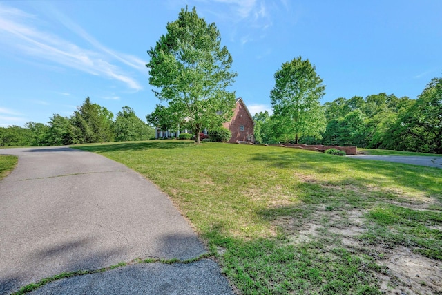 exterior space featuring a front lawn