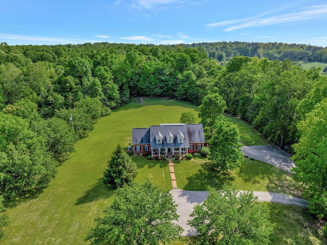 bird's eye view with a view of trees