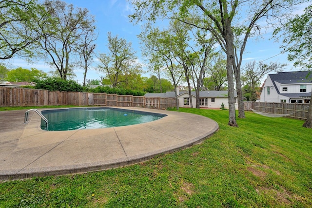 view of swimming pool with a lawn, a patio, a fenced in pool, and a fenced backyard