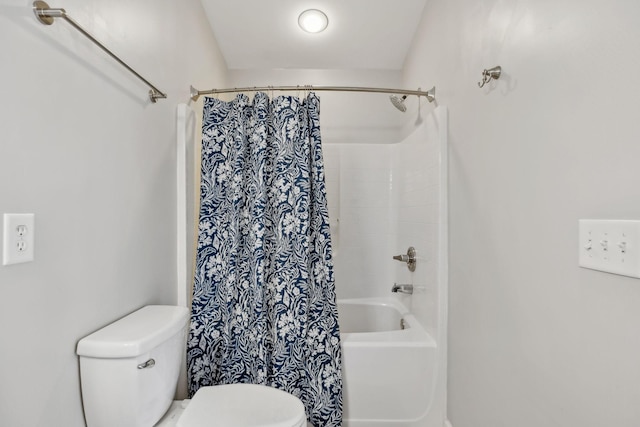 bathroom with toilet and shower / bathtub combination with curtain