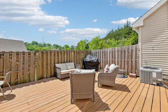 wooden deck with fence and central AC