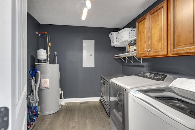 laundry area featuring cabinet space, independent washer and dryer, water heater, and electric panel