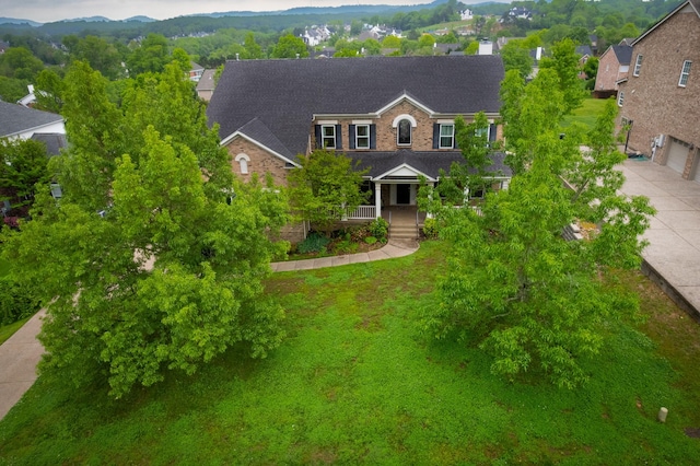 9657 Brass Valley Dr, Brentwood, TN 37027 - view of front of home with a garage, covered porch, and driveway