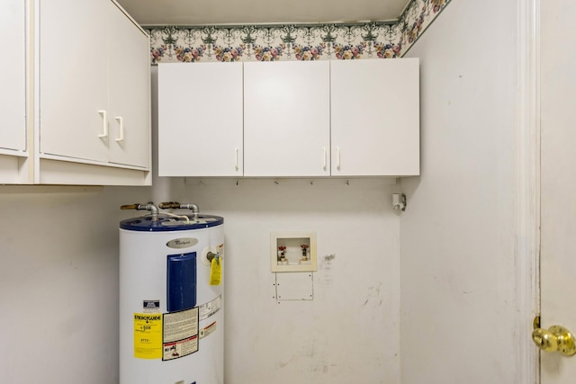 702 1st Ave, Mount Pleasant, TN 38474 - clothes washing area featuring cabinet space, washer hookup, and water heater