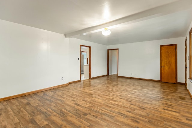 702 1st Ave, Mount Pleasant, TN 38474 - unfurnished room with baseboards and wood finished floors