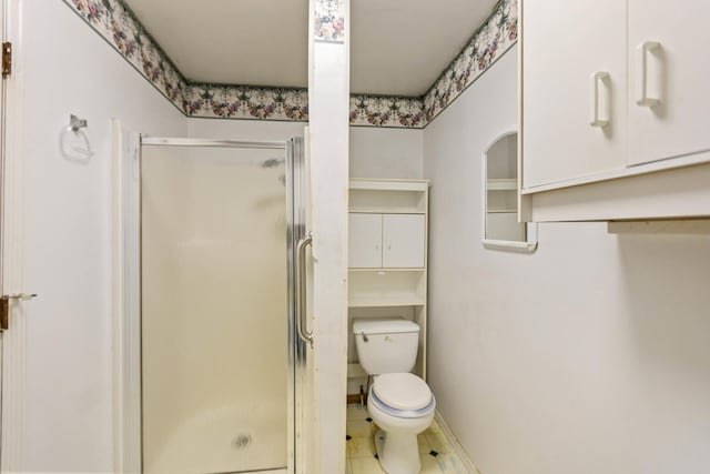 702 1st Ave, Mount Pleasant, TN 38474 - full bathroom with baseboards, tile patterned flooring, toilet, and a shower stall