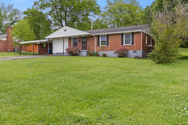 702 1st Ave, Mount Pleasant, TN 38474 - single story home featuring a carport, driveway, a front lawn, and crawl space
