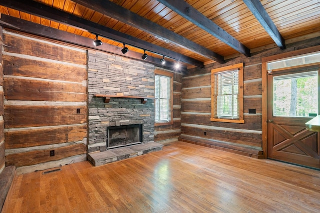 4701 Hessey Rd, Mount Juliet, TN 37122 - unfurnished living room featuring a healthy amount of sunlight, track lighting, beam ceiling, and wood finished floors