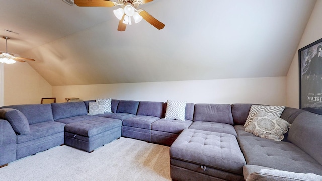 living area with carpet flooring, ceiling fan, and vaulted ceiling