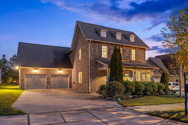 743 Fontwell Ln, Franklin, TN 37064 - view of front facade featuring an attached garage, driveway, a front lawn, and brick siding