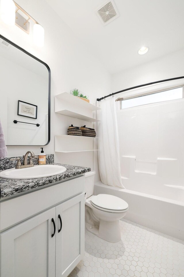 743 Fontwell Ln, Franklin, TN 37064 - full bath featuring tile patterned flooring, vanity, toilet, shower / bath combination with curtain, and visible vents