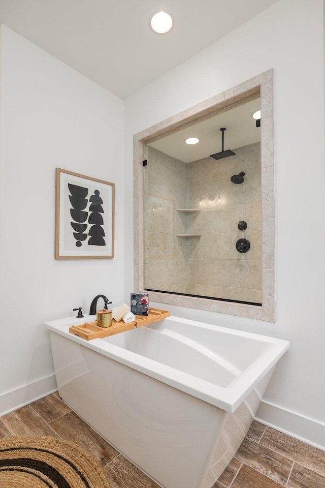 743 Fontwell Ln, Franklin, TN 37064 - full bathroom featuring a freestanding bath, baseboards, a tile shower, and recessed lighting