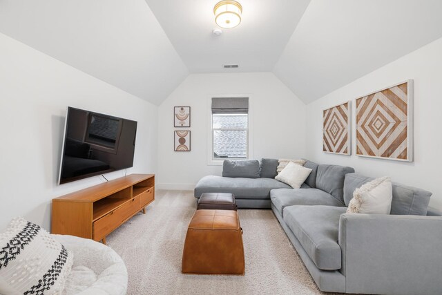 743 Fontwell Ln, Franklin, TN 37064 - living area with baseboards, visible vents, carpet, and vaulted ceiling