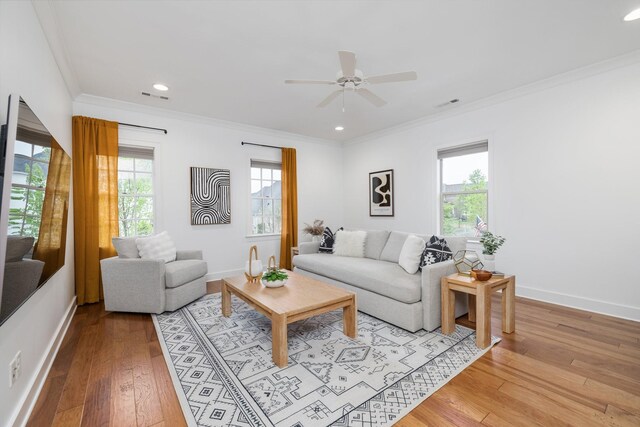 743 Fontwell Ln, Franklin, TN 37064 - living room featuring ornamental molding, light wood-type flooring, and a wealth of natural light