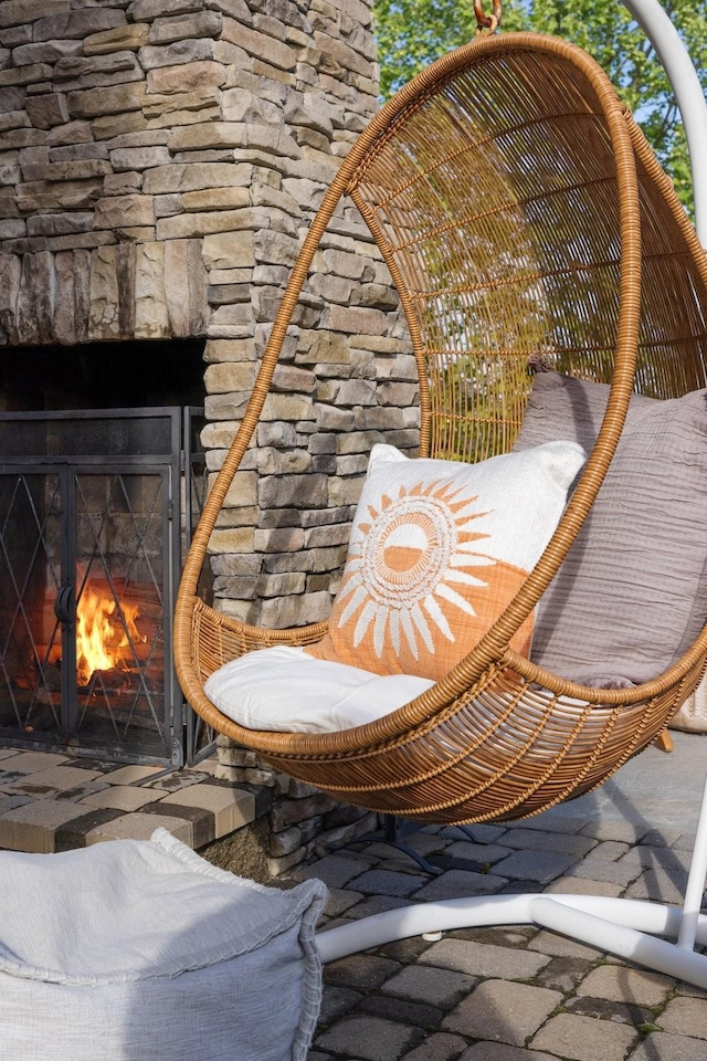 743 Fontwell Ln, Franklin, TN 37064 - exterior details featuring a lit fireplace