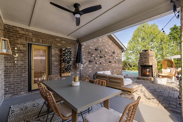 743 Fontwell Ln, Franklin, TN 37064 - view of patio / terrace featuring an outdoor stone fireplace, ceiling fan, and outdoor dining space