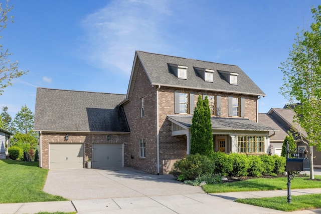 743 Fontwell Ln, Franklin, TN 37064 - traditional-style home with brick siding, a garage, driveway, and a front lawn
