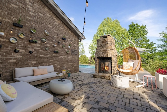 743 Fontwell Ln, Franklin, TN 37064 - view of patio / terrace with an outdoor living space with a fireplace