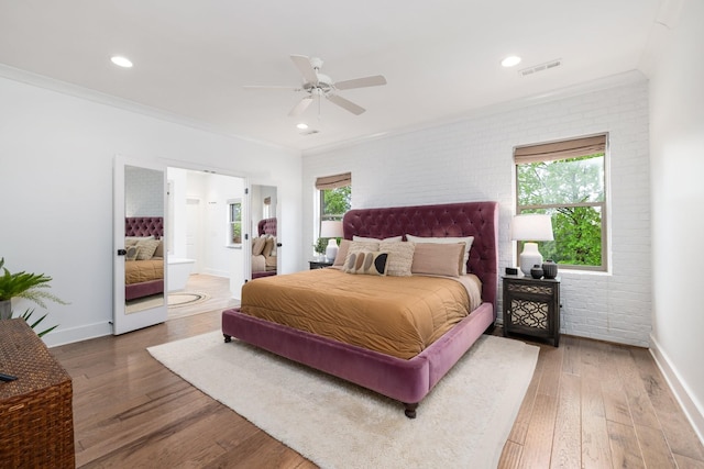 743 Fontwell Ln, Franklin, TN 37064 - bedroom featuring crown molding, multiple windows, wood finished floors, and visible vents