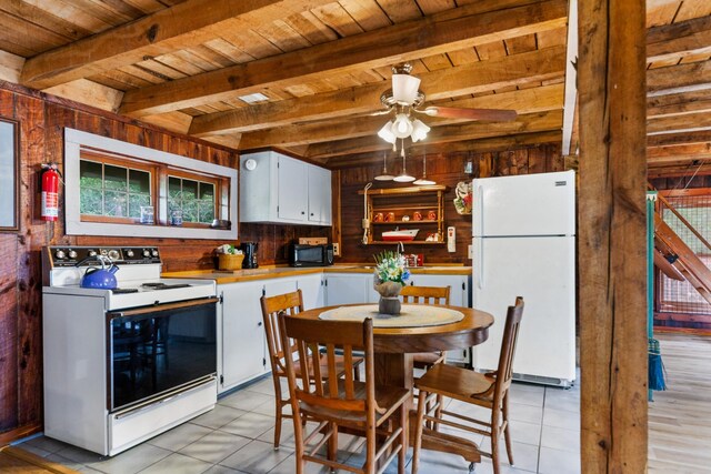4428 Deer Creek Rd, Linden, TN 37096 - kitchen with white appliances, light tile patterned floors, beam ceiling, and wood ceiling