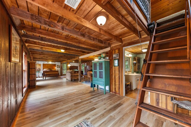 4428 Deer Creek Rd, Linden, TN 37096 - interior space with wood ceiling, ceiling fan, beamed ceiling, and wood finished floors