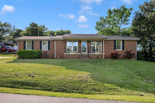 6505 Firestone Ct, Nashville, TN 37209 - single story home featuring a front yard and brick siding