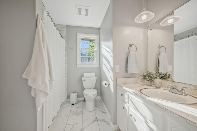 6505 Firestone Ct, Nashville, TN 37209 - bathroom with vanity, toilet, a shower with shower curtain, marble finish floor, and baseboards