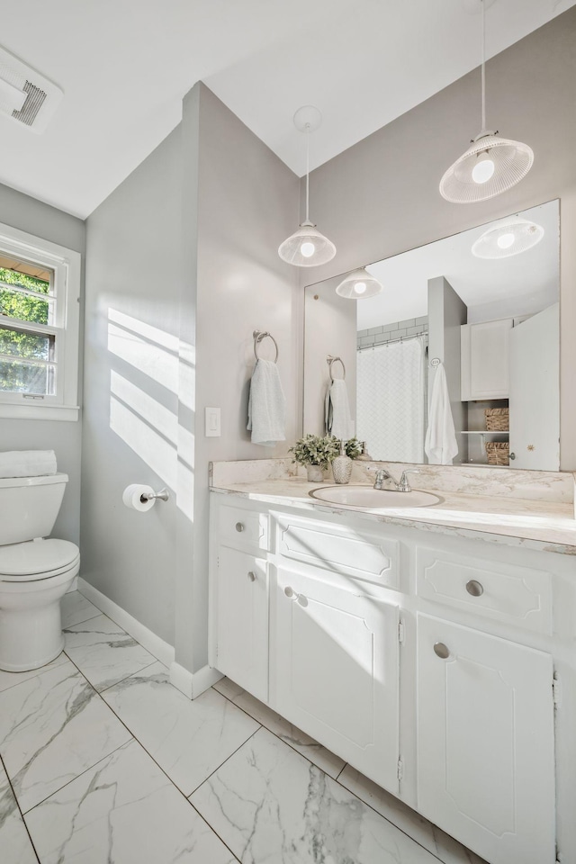 6505 Firestone Ct, Nashville, TN 37209 - bathroom with visible vents, baseboards, vanity, toilet, and marble finish floor