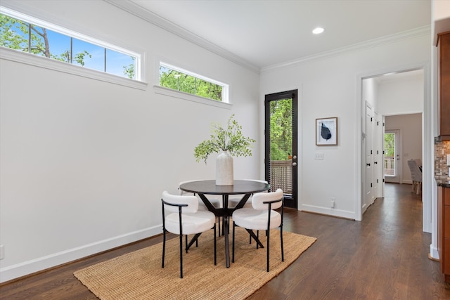 dining area with recessed lighting, baseboards, ornamental molding, and dark wood finished floors