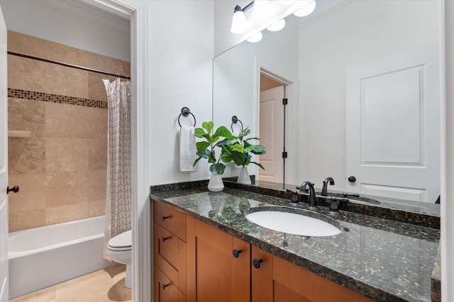 full bathroom featuring crown molding, vanity, tile patterned floors, toilet, and shower / bath combo with shower curtain