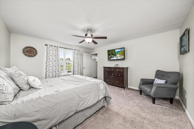 bedroom with baseboards, ceiling fan, and light carpet