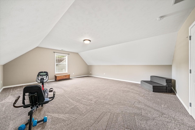 bonus room with baseboards, vaulted ceiling, and carpet