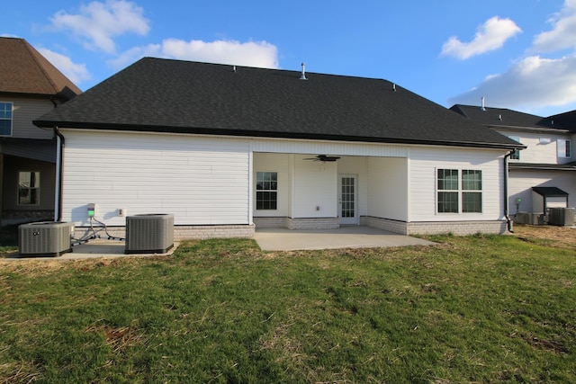 back of house featuring central AC unit, ceiling fan, and a patio area